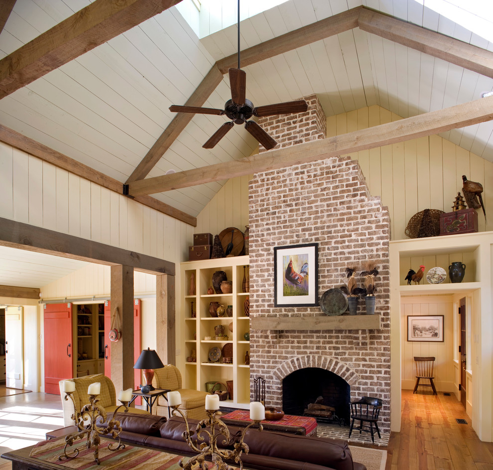 Brick Fireplace house design with high ceilings