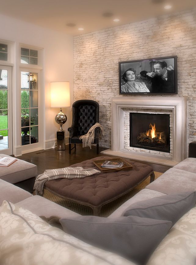 Fireplace frame and neutral art above